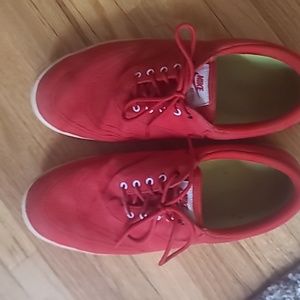 Red Nike canvas spikeless golf shoes